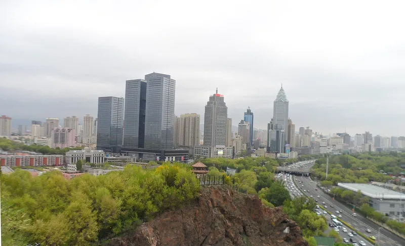 Urumqi city skyline with high-rise towers under a wide sky in Xinjiang, China